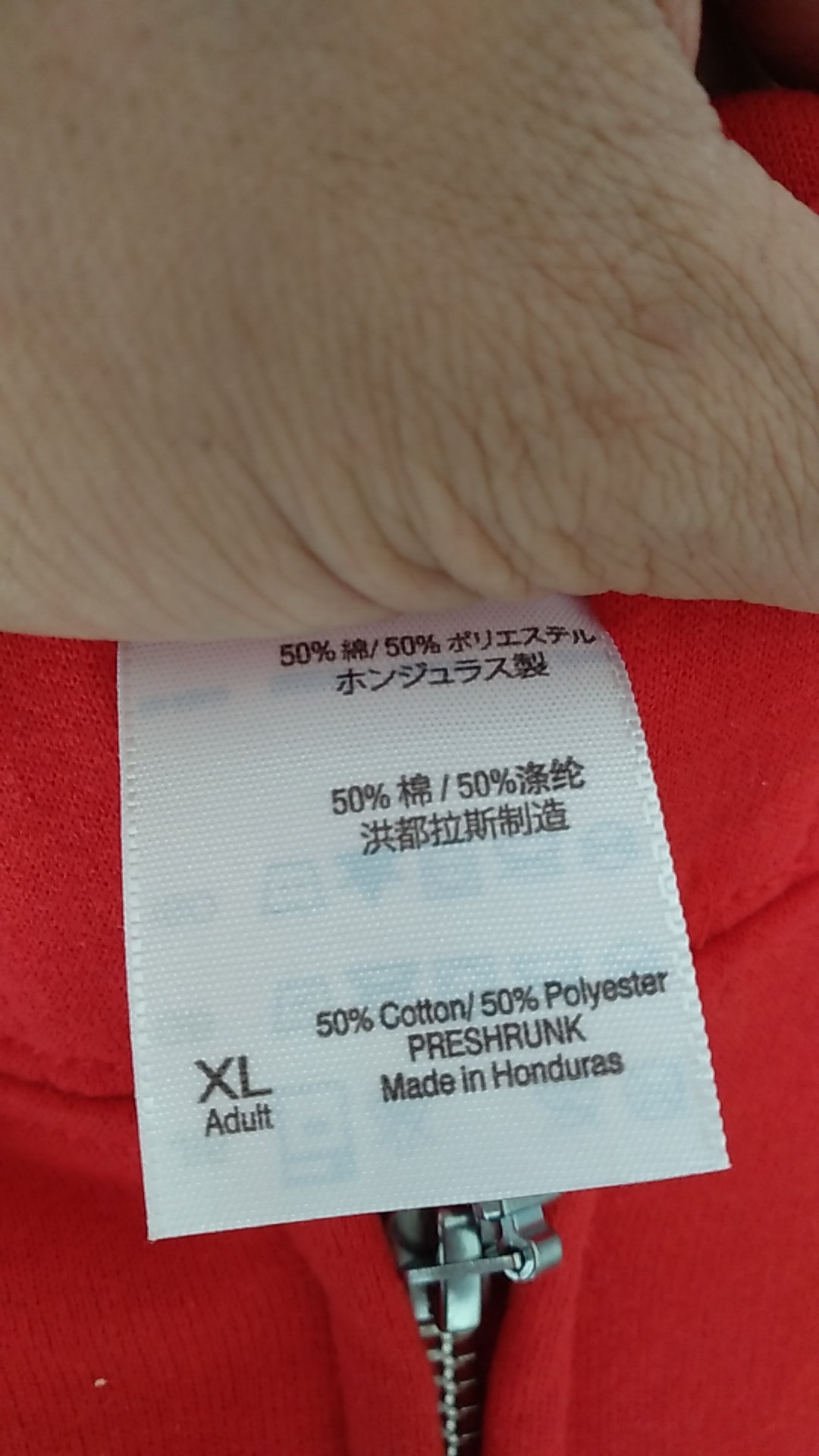 服装洗水标成分标识特写，面料辨别与质量判断方法